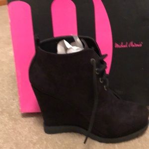 Brand New Never worn Black lace up ankle boot.